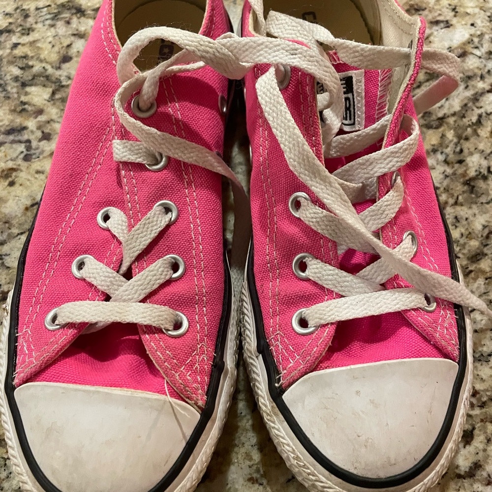 Bright pink converse